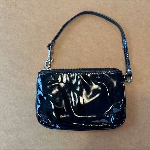 Black patent leather Coach wristlet,‎ silver hardware, wine colored lining - Picture 3 of 9